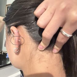 Atomic Tattoos - Crooked helix piercing.