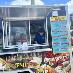 Taco Rico - Owner in the window