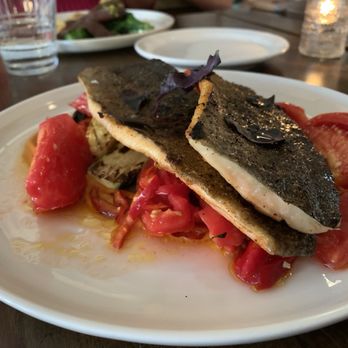 Locavore - Trout was tasteful though an addition with farro or couscous with have help absorb the flavors of the sauce! - New American Near Me - Fredericksburg, Virginia