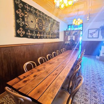 Piala Georgian Cuisine - a long table with chairs - Georgian Near Me - Sebastopol, California Piala Georgian Cuisine - a long table with chairs - Georgian Near Me - Sebastopol, California