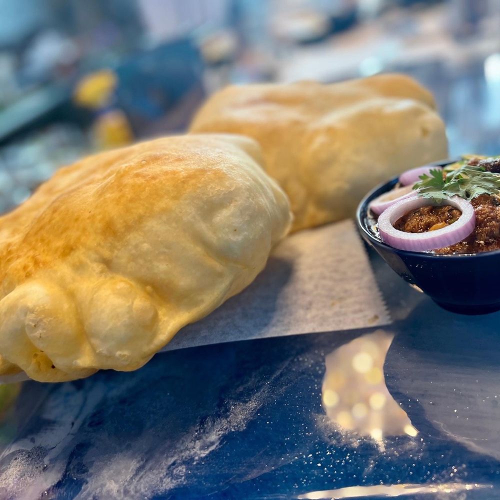 The Best 10 Restaurants near International Plaza and Bay Street in