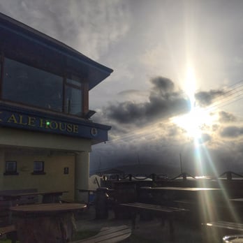 The Dirty Duck - The sun splitting the the clouds over The Dirty Duck - Pubs Near Me - Holywood, NDN