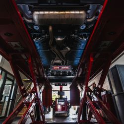 All-Star Automotive East - Alignment rack with vehicle.
