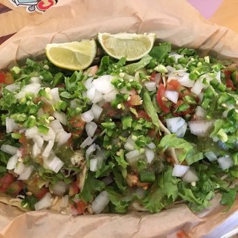 Cabo Bob's Burritos - There are 3 tacos in there somewhere - Mexican Near Me - Austin, Texas