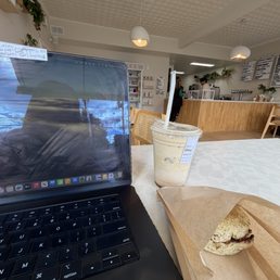 Latte and everything English muffin with jelly and garlic butter