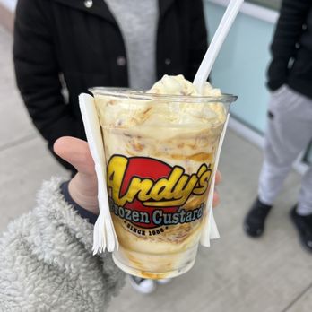 Andy's Frozen Custard - a person holding a cup of ice cream - Ice Cream & Frozen Yogurt Near Me - Sevierville, Tennessee