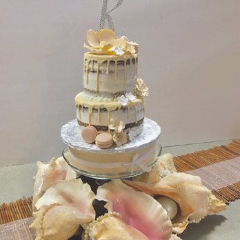 Sugar Divas Cakery, LLC - Wedding Cake -Bottom later is pina colada, top layer is vanilla, with macaroons. - Bakeries Near Me - Orlando, Florida Sugar Divas Cakery, LLC - Wedding Cake -Bottom later is pina colada, top layer is vanilla, with macaroons. - Bakeries Near Me - Orlando, Florida