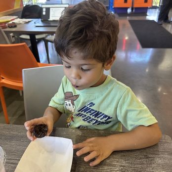 Pieology - Enjoying his complementary dessert! - Pizza Near Me - Yuba City, California Pieology - Enjoying his complementary dessert! - Pizza Near Me - Yuba City, California