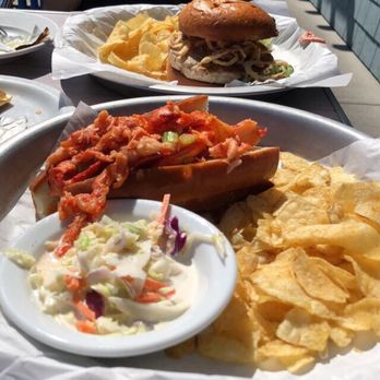 Sam's Chowder House - The Naked (front) & Salmon Burger (back) | IG: @nomwithelaine - Seafood Near Me - Half Moon Bay, California Sam's Chowder House - The Naked (front) & Salmon Burger (back) | IG: @nomwithelaine - Seafood Near Me - Half Moon Bay, California