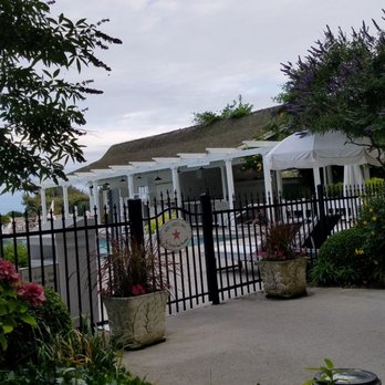 Blue Pig Tavern - Sitting by the pool - New American Near Me - Cape May, New Jersey Blue Pig Tavern - Sitting by the pool - New American Near Me - Cape May, New Jersey