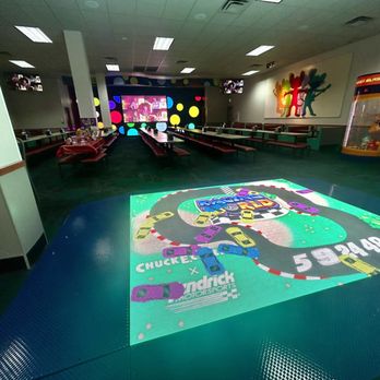Chuck E. Cheese - Looking towards the party area and screen. - Pizza Near Me - Rohnert Park, California