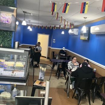 Chamos Grill - Seating area is around the corner, not visible right when you walk inside - Venezuelan Near Me - Charlotte, North Carolina