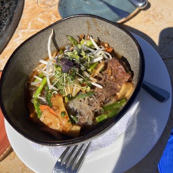 Roy's at Pebble Beach - Beef Dashi saifun noodle bowl - short rib and vegetables - Asian Fusion Near Me - Pebble Beach, California Roy's at Pebble Beach - Beef Dashi saifun noodle bowl - short rib and vegetables - Asian Fusion Near Me - Pebble Beach, California