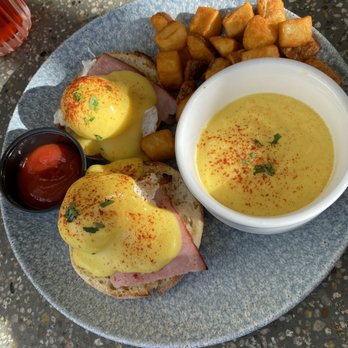 Deck. - Eggs Benedict, eggs poached hard, extra Hollandaise sauce on the side, w breakfast potatoes and ketchup. - Hawaiian Near Me - Honolulu, Hawaii Deck. - Eggs Benedict, eggs poached hard, extra Hollandaise sauce on the side, w breakfast potatoes and ketchup. - Hawaiian Near Me - Honolulu, Hawaii