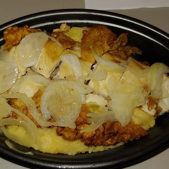 Pollo Tropical - Crispy pollo bites, onions, and mashed potatoe tropichop. - Fast Food Near Me - Miami, Florida Pollo Tropical - Crispy pollo bites, onions, and mashed potatoe tropichop. - Fast Food Near Me - Miami, Florida