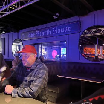 The Hearth House - The new booth tables behind this man - Sports Bars Near Me - La Mesa, California