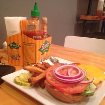 Miles Table - Turkey burger. I also appreciate the sriracha, cholula, ketchup options - American Near Me - Philadelphia, Pennsylvania Miles Table - Turkey burger. I also appreciate the sriracha, cholula, ketchup options - American Near Me - Philadelphia, Pennsylvania
