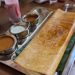 Varam - The chicken masala dosa was perfectly cooked and absolutely gigantic. The condiments were also very tasty.