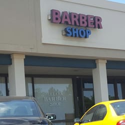 Melody Barber Shop - Front of shop facing East on Melody