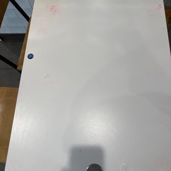 McDonald's - Table with sticky residue and an optional fly. He moved to the next table over. - Fast Food Near Me - Brady, Texas