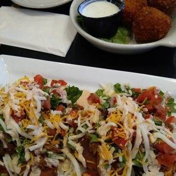 Manny's Sports Tavern - Starters: homemade tater tots and corn cakes. - American Near Me - Sandusky, Ohio Manny's Sports Tavern - Starters: homemade tater tots and corn cakes. - American Near Me - Sandusky, Ohio