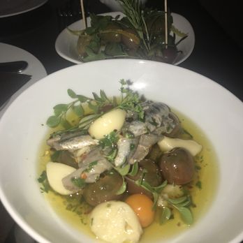 Miel Restaurant - Best appetizer there! Heirloom cherry tomatoes with anchovy, garlic, and herbs. - French Near Me - Nashville, Tennessee