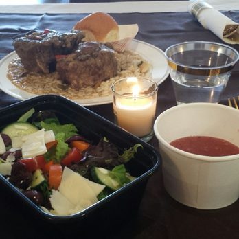 Bobbi's Homestyle Catering - Oxtails & gravy over rice dinner accompanied by salad of bold flavors & raspberry vinaigrette. - Caterers Near Me Bobbi's Homestyle Catering - Oxtails & gravy over rice dinner accompanied by salad of bold flavors & raspberry vinaigrette. - Caterers Near Me