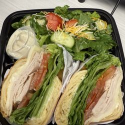 Turkey & Cheese Sandwich on a croissant with a side salad!