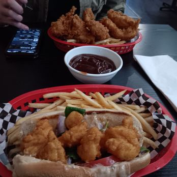 Sheila B'Z - Shrimp po' boy and fries. The other is a order of stripes and fries. - Breakfast & Brunch Near Me - Stockton, California Sheila B'Z - Shrimp po' boy and fries. The other is a order of stripes and fries. - Breakfast & Brunch Near Me - Stockton, California
