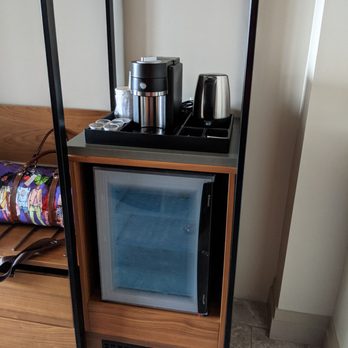 Hyatt Regency - Frosted glass mini fridge and coffee bar on top - Hotels Near Me - Renton, Washington
