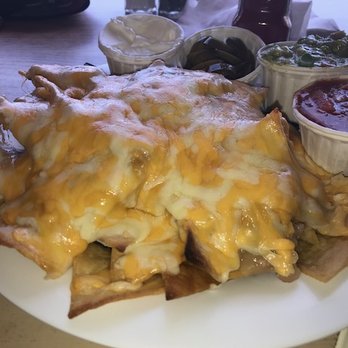 Luau Larry's - Our second try with the nachos. Look at all that cheese. These were great. - New American Near Me - Avalon, California Luau Larry's - Our second try with the nachos. Look at all that cheese. These were great. - New American Near Me - Avalon, California