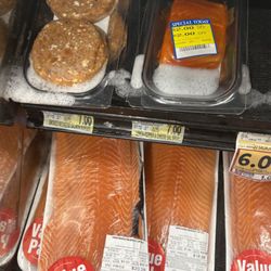 Harris Teeter - Notice the soap that dripped down when washing the seafood bins. It may have contaminated the other meats below.