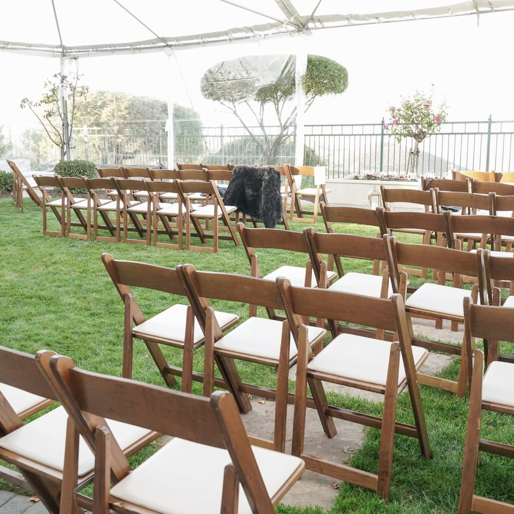 Leandra Events - Creative seating to avoid uneven ground.  Open area made for a good photo op when walking down the aisle. - Party & Event Planning Near Me