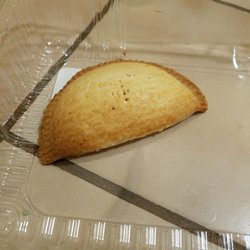 Pan de Antaño Repostería Tradicional - Enjoying empanadas