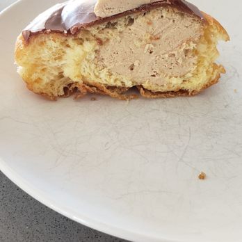 Fluffy's Donuts To Go - Cross section of the peanut butter filled. Tasty! - Donuts Near Me - Spokane, Washington
