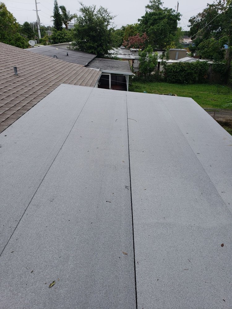 Slide of Rick's Roofing and Repairs