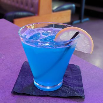 Jambo Grill - a blue drink with a slice of lemon - Caribbean Near Me - Hoover, Alabama Jambo Grill - a blue drink with a slice of lemon - Caribbean Near Me - Hoover, Alabama