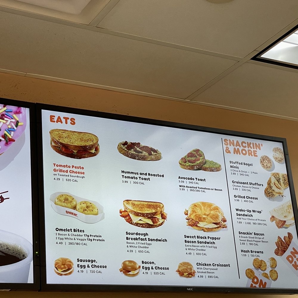 a menu and a cup of coffee a menu and a cup of coffee