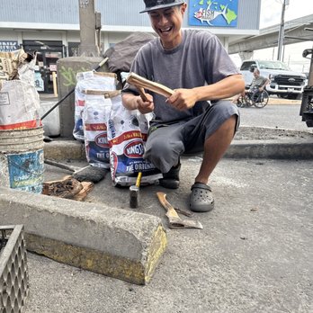Diamond's Kitchen - choppin up wood chips for the pit - Food Trucks Near Me - Waipahu, Hawaii