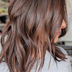 Warm and natural highlights. Low maintenance cut and color done by Raha.