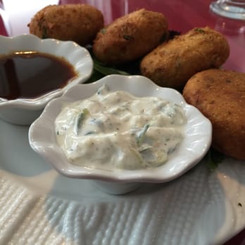 Karahi King - a plate of food with dipping sauce - Indian Near Me - Prince George, British Columbia
