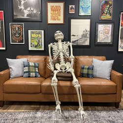 Delaneys Furniture Auction & Liquidation - Sofa & skeleton from Delaney