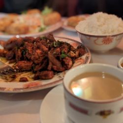 Gang Seng - Basil garlic chicken dish and in the back ground are the vegetarian momos with a kind of coleslaw. Along with their famous butter tea.
