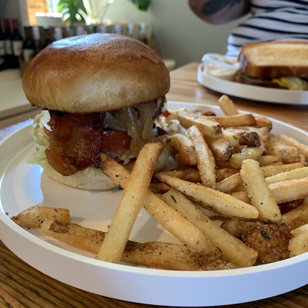 Mouthwatering burger & fries with garlic aioli Mouthwatering burger & fries with garlic aioli