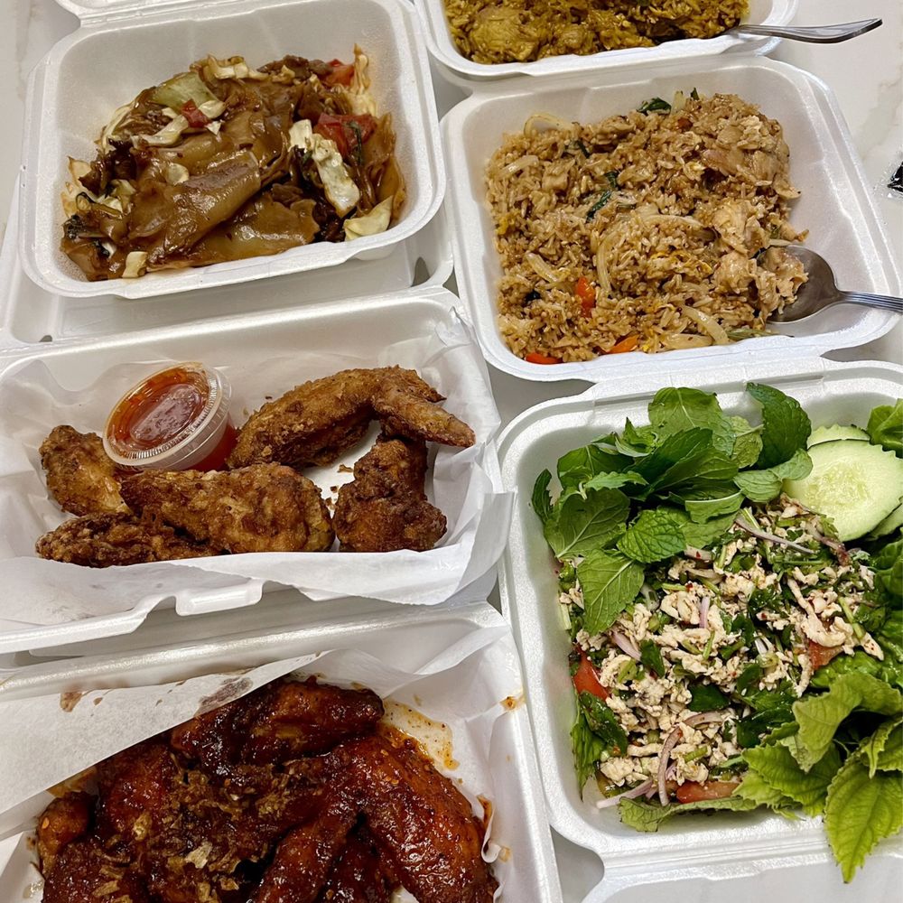 Boun Bistro - The spread: PAD KEE MAO (beef), YELLOW FRIED RICE (order error), BASIL FRIED RICE (pork), LARB CHICKEN, BAM BAM WINGS, WINGS - Thai Near Me - Fort Worth, Texas Boun Bistro - The spread: PAD KEE MAO (beef), YELLOW FRIED RICE (order error), BASIL FRIED RICE (pork), LARB CHICKEN, BAM BAM WINGS, WINGS - Thai Near Me - Fort Worth, Texas