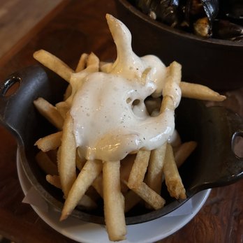 Cured - Aioli fries on the side of the Beer Can Mussels - Cocktail Bars Near Me - San Antonio, Texas Cured - Aioli fries on the side of the Beer Can Mussels - Cocktail Bars Near Me - San Antonio, Texas