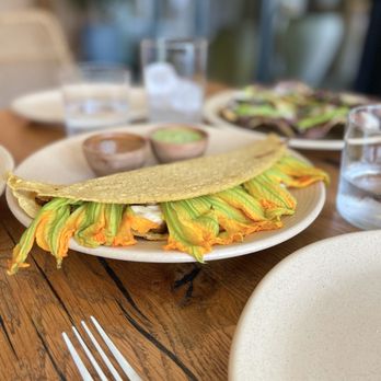 Oaxaca - My absolute favorite menu item. Flor De Calabaza - Squash blossom, Oaxaca cheese, sautéed mushrooms, roasted onions, assorted salsa - Mexican Near Me - Atlanta, Georgia