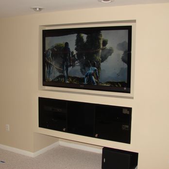AVID Resources - Recessed TV Installation with Custom Built Rack below that houses the equipment. - TV Mounting Near Me - Leesburg, Virginia