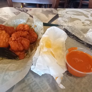 Wingstop - a tray of food on a table - Chicken Wings Near Me - Columbus, Ohio Wingstop - a tray of food on a table - Chicken Wings Near Me - Columbus, Ohio