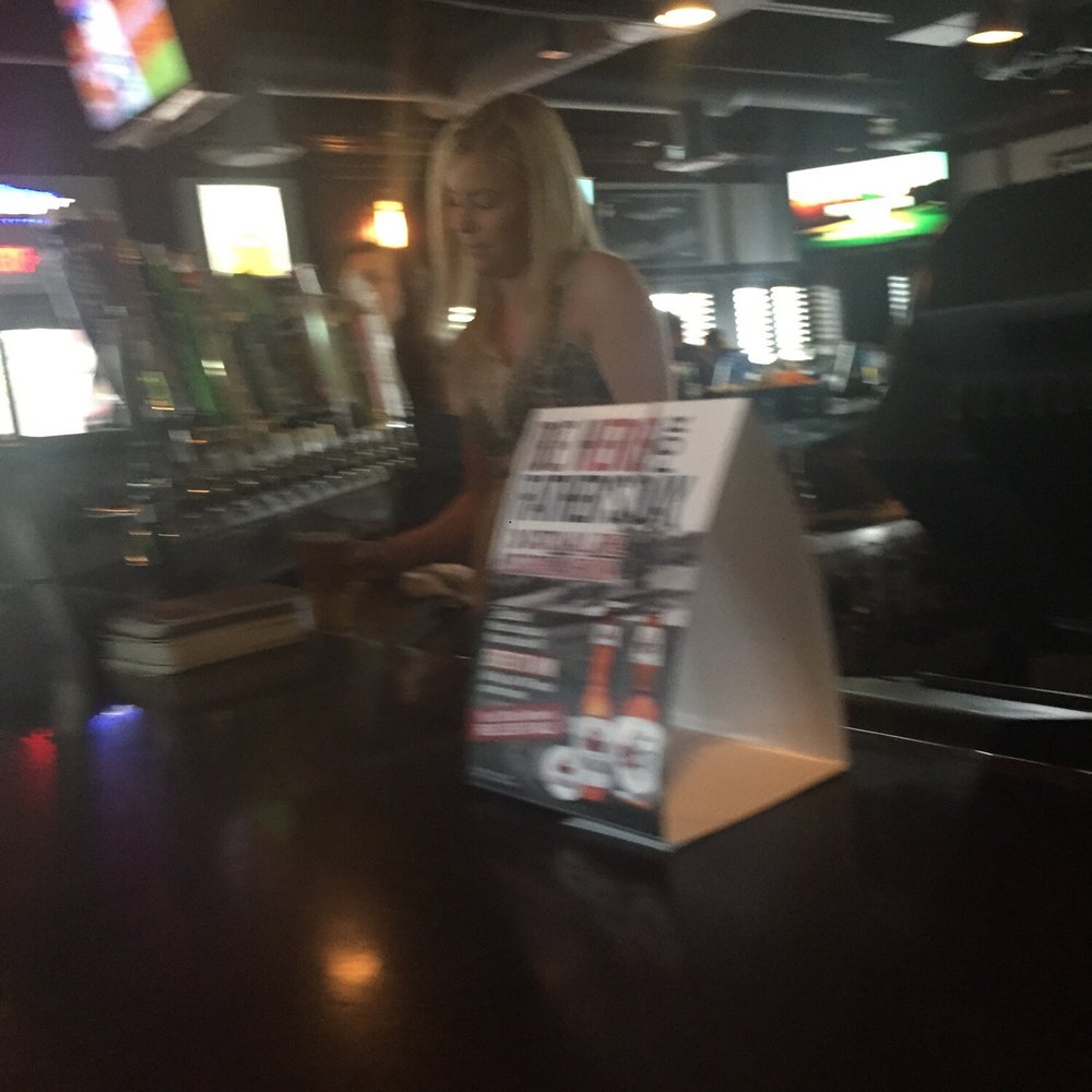 a woman at a bar a woman at a bar